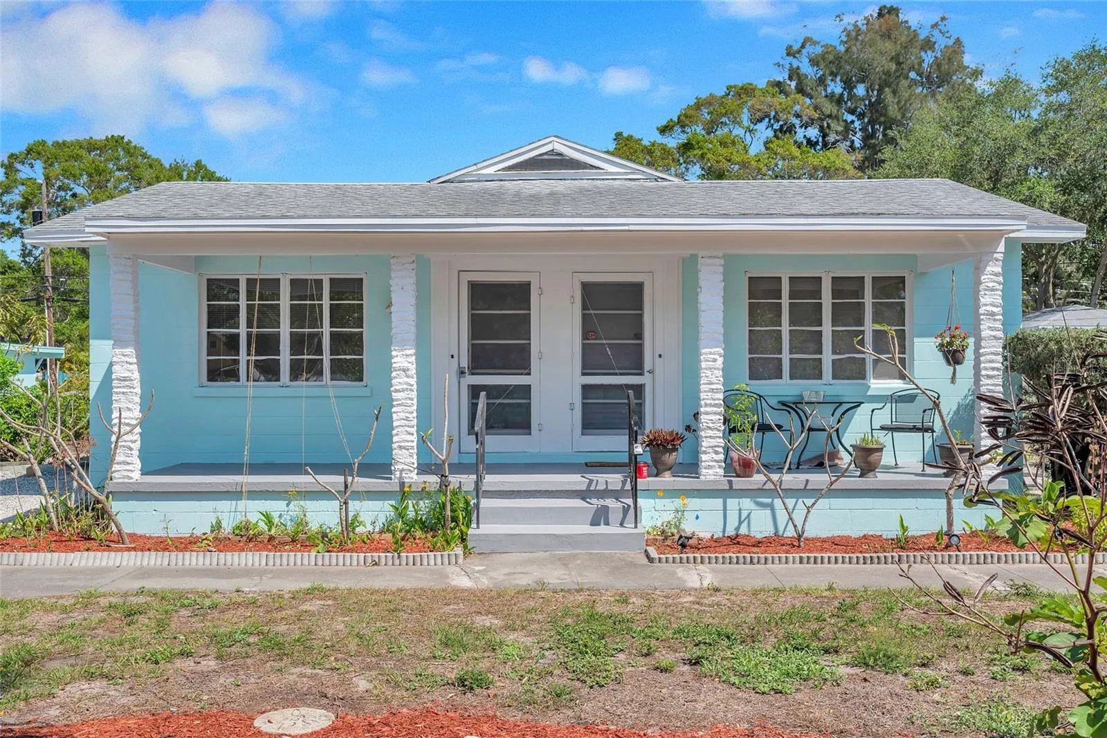 5027 duplex - covered front porch with French-door entries