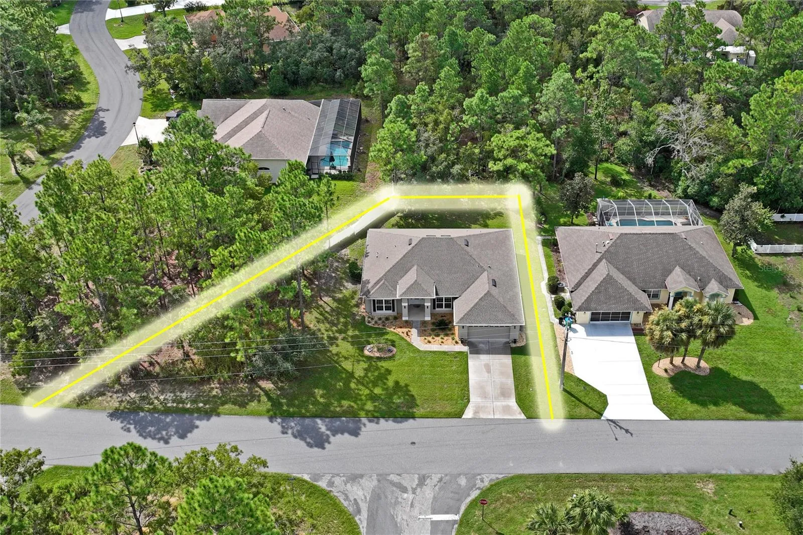 Land has a piece of corner lot included!!! More privacy and nature!!