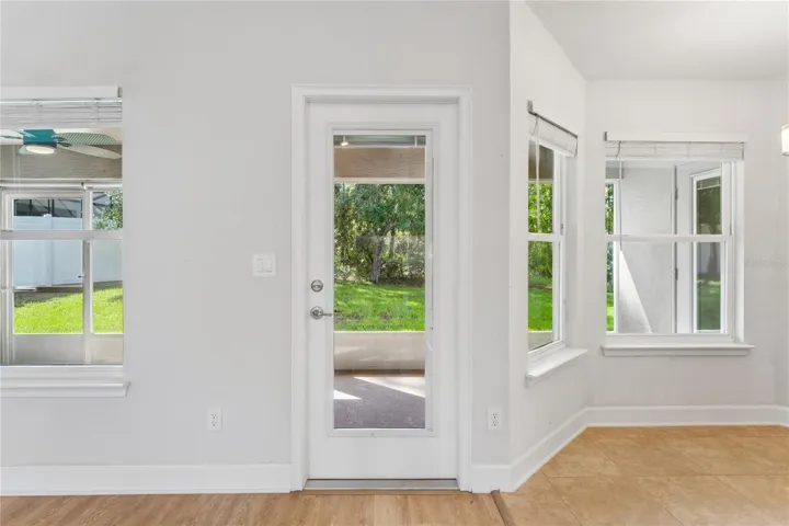 French door leading from great room to screened lanai