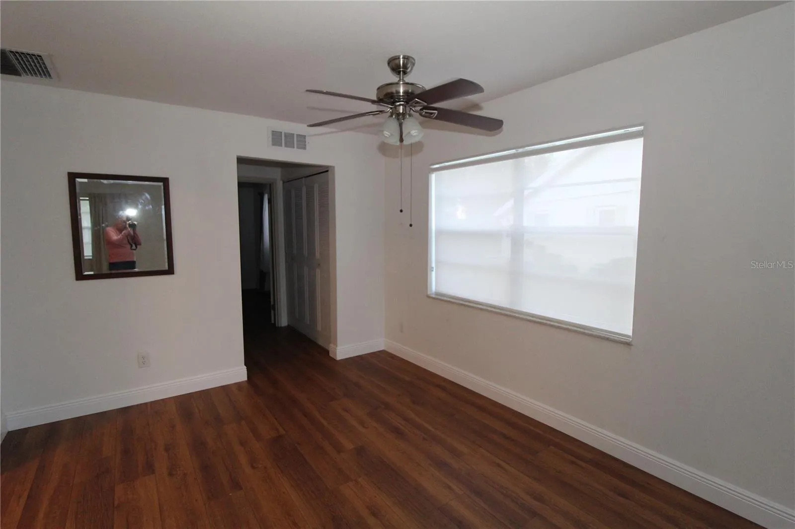 Dining area with great natural light.  Hallway leads to the guest bath and bedroom.