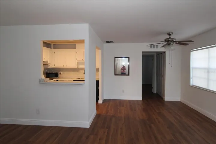 Kitchen is convenient to the dining and living areas.