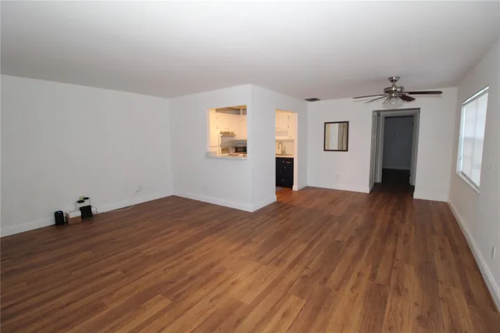 From front entrance, living and dining areas.  Convenient pass through window from the kitchen.