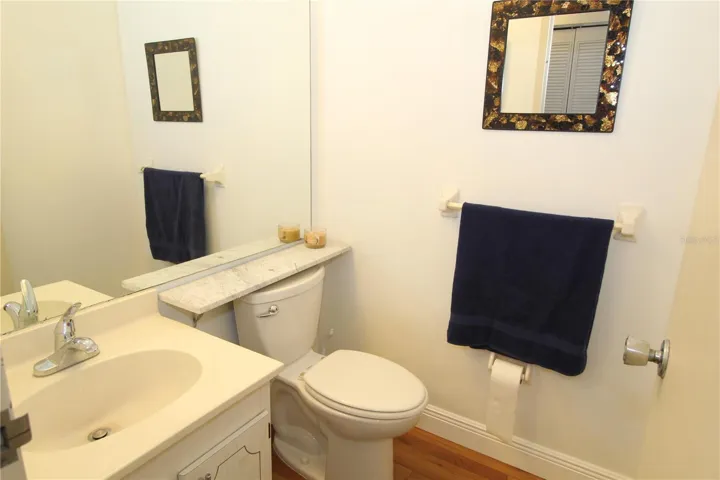 Guest half bath, pretty and bright.