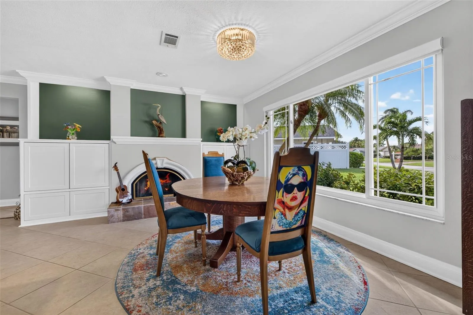 Formal dining/or living area with wood burnng fireplace