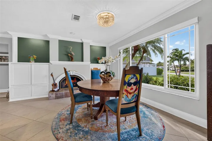 Formal dining/or living area with wood burnng fireplace