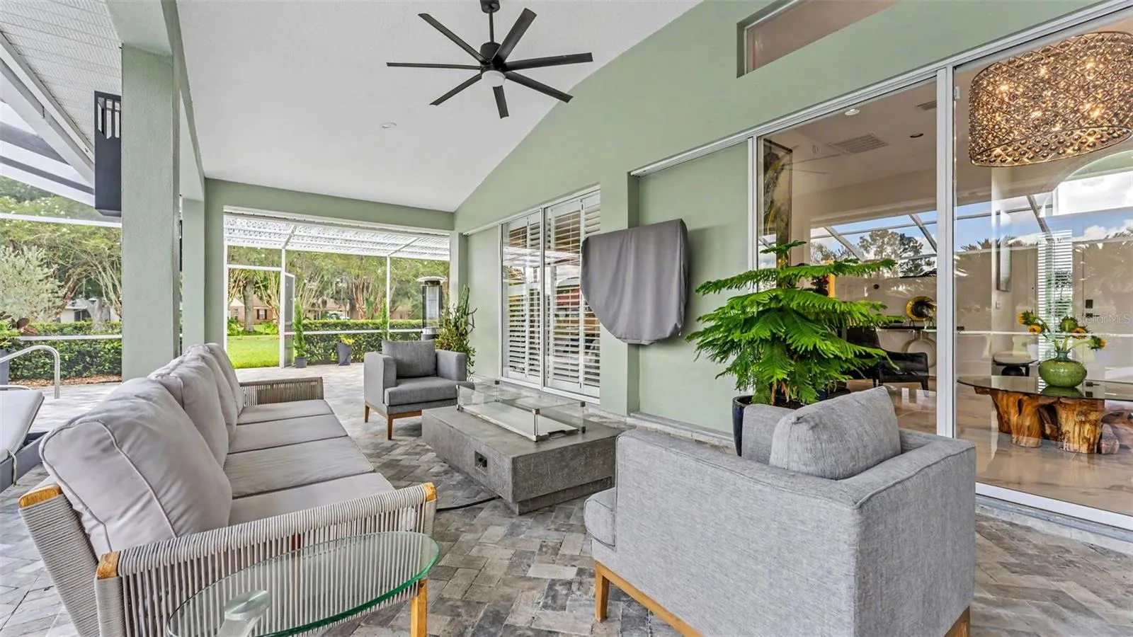 The lanai is comfortably sized and easily allows for a full seating group and a separate dining area - perfect for entertaining