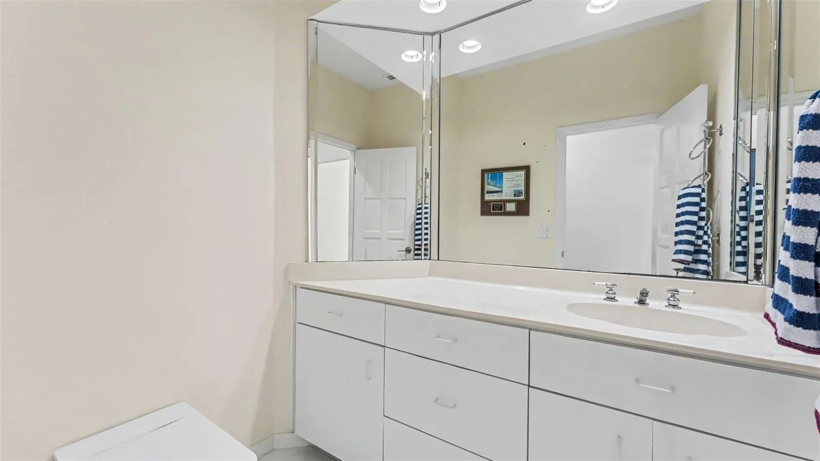 Half bath accessed from hallway