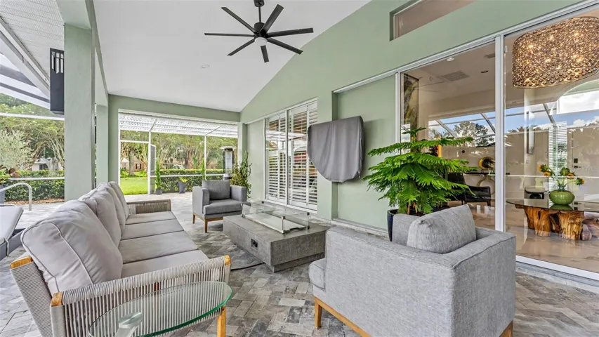 The lanai is comfortably sized and easily allows for a full seating group and a separate dining area - perfect for entertaining
