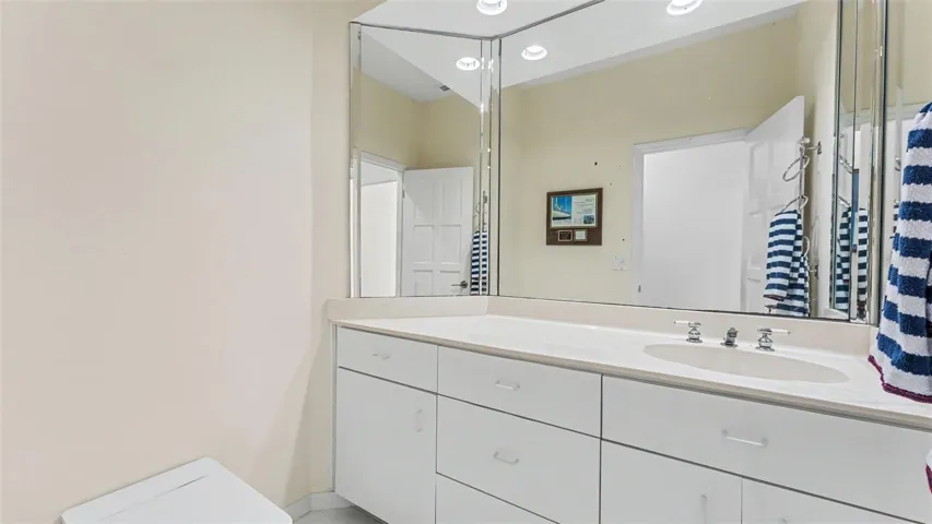 Half bath accessed from hallway