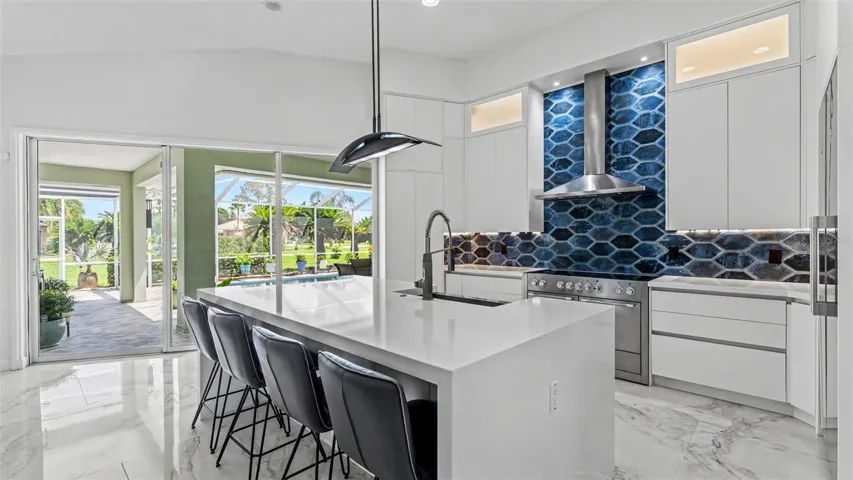Kitchen with breakfast bar at island