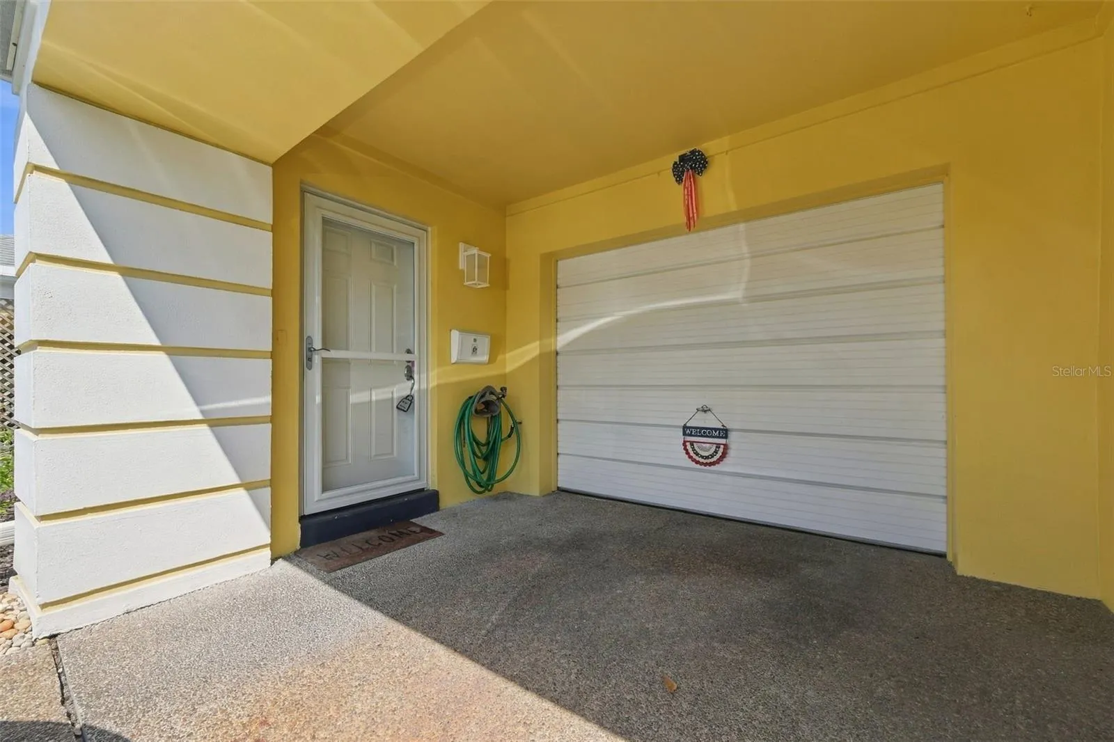 Entrance and Attached Garage