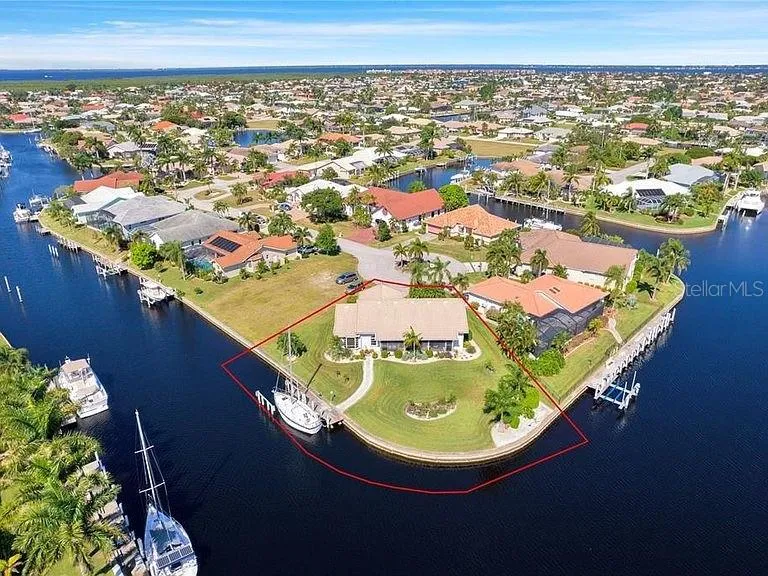 Seller provided photo with seawall in tact.