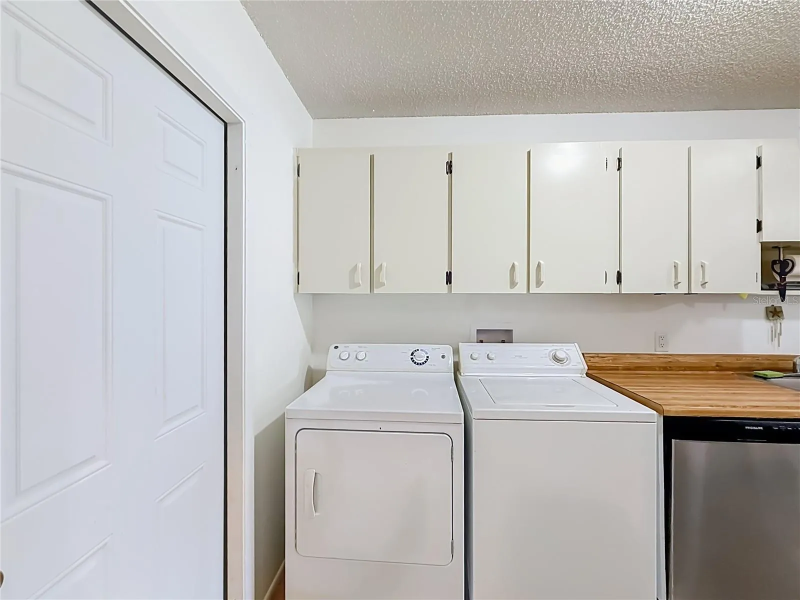 In- unit laundry with washer and dryer.
