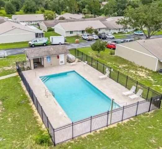 Enjoy the community pool, perfect for cooling off and embracing the relaxed Florida lifestyle.