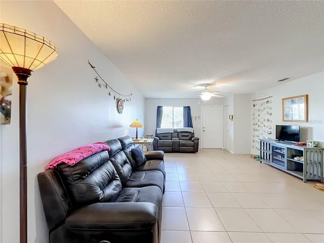 Expansive living area featuring large windows that fill the space with abundant natural light.