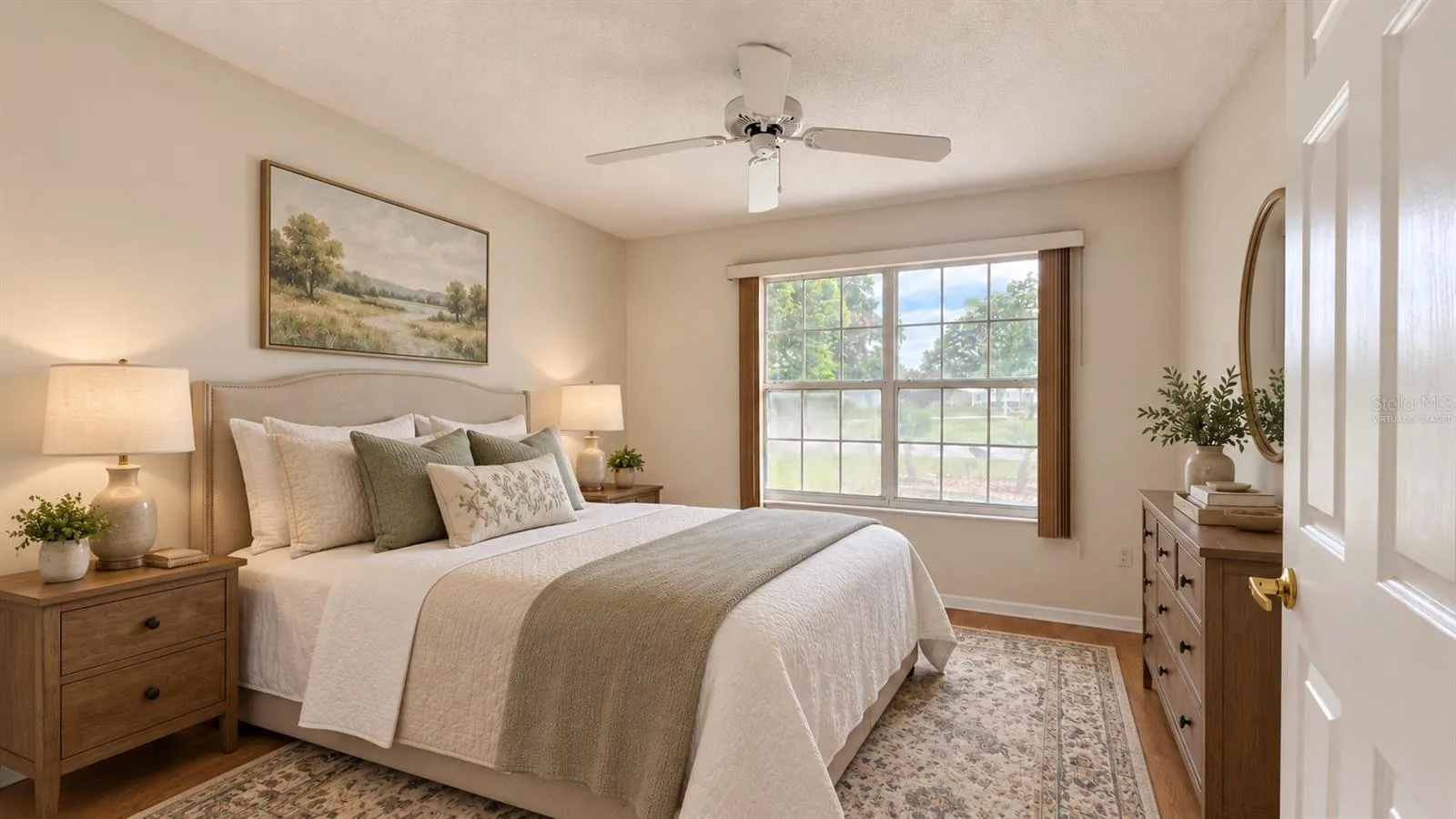 2 of 3 total bedrooms. Virtually staged as a guest bedroom here.