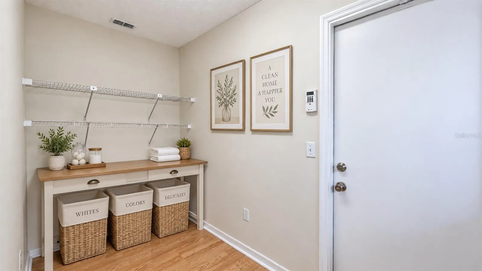 Large laundry room with tons of storage possibilities. W/D on the other side. Door leads to garage.
