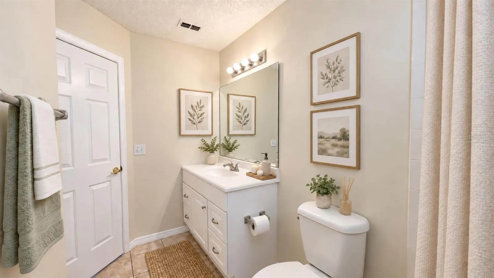 Guest bathroom is spacious. Virtually staged.