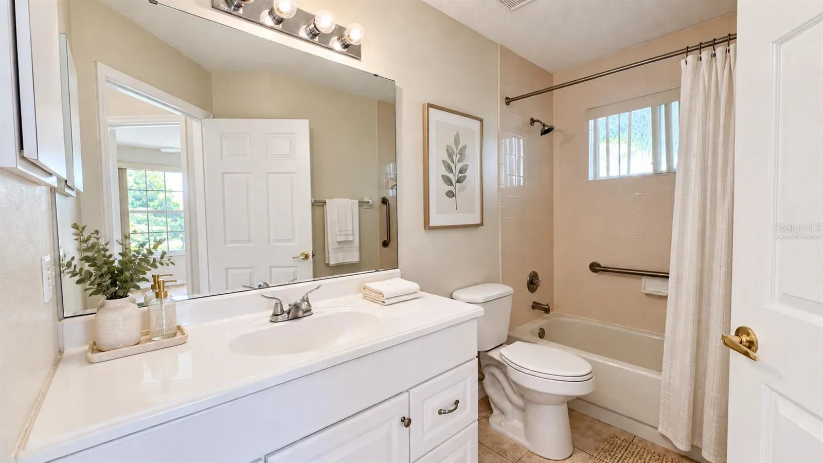 Guest bathroom is spacious. Virtually staged.