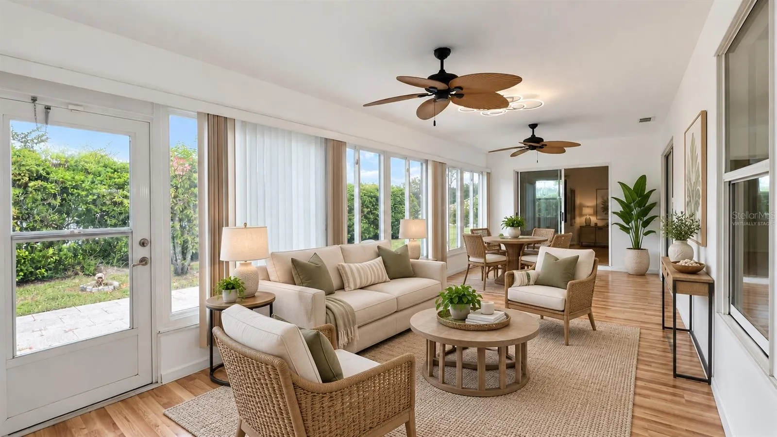 400 sq ft enclosed, air-conditioned lanai. Virtually staged.