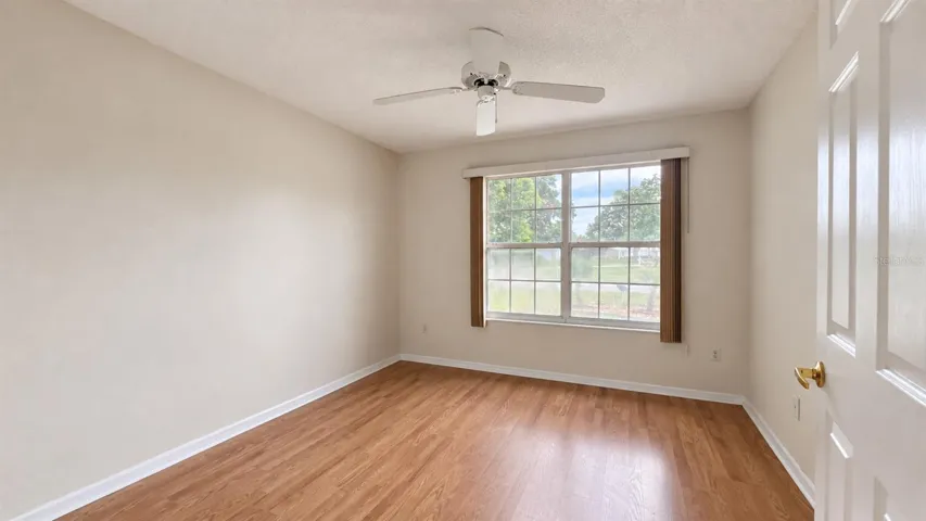 2 of 3 total bedrooms unstaged.