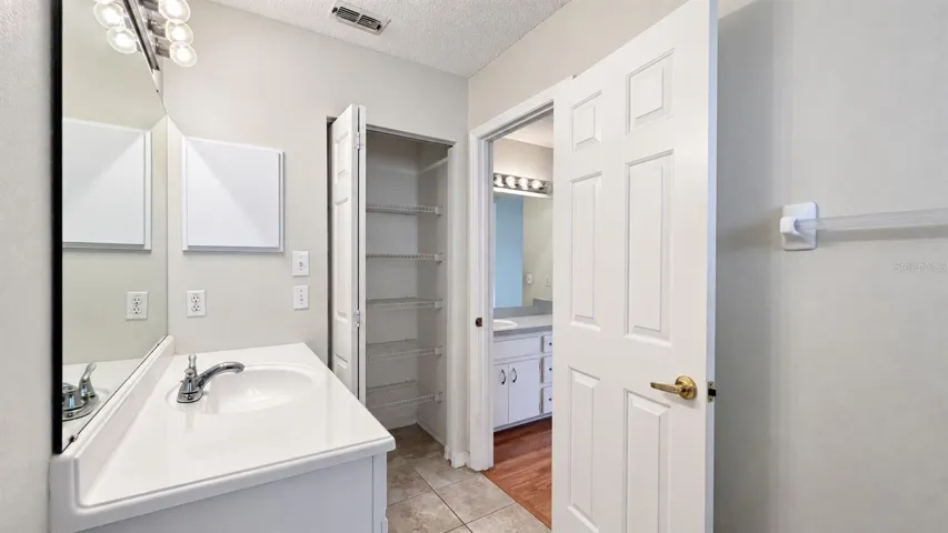 Master bedroom en-suite bath with large WIC.