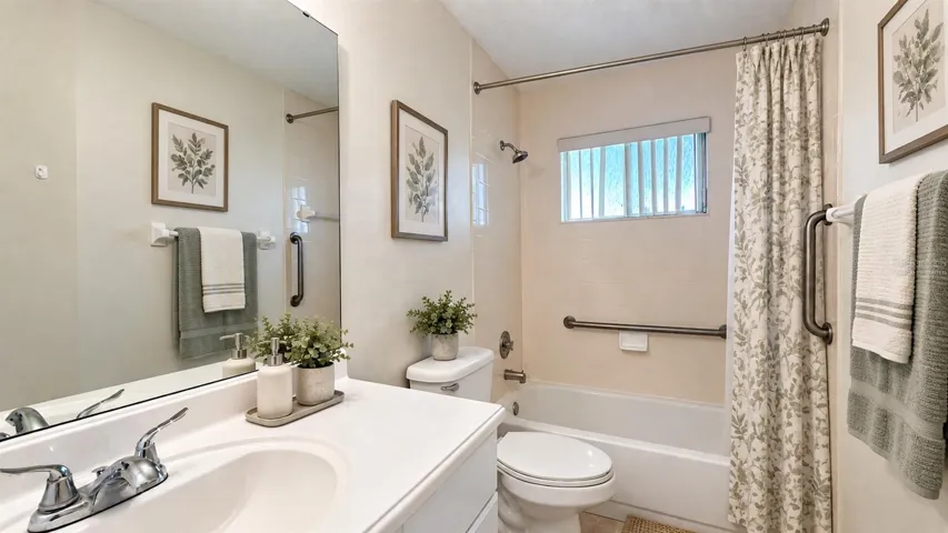 Guest bathroom is spacious. Virtually staged.
