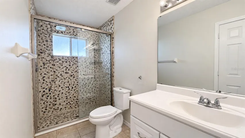 Master bedroom en-suite bath with large WIC.