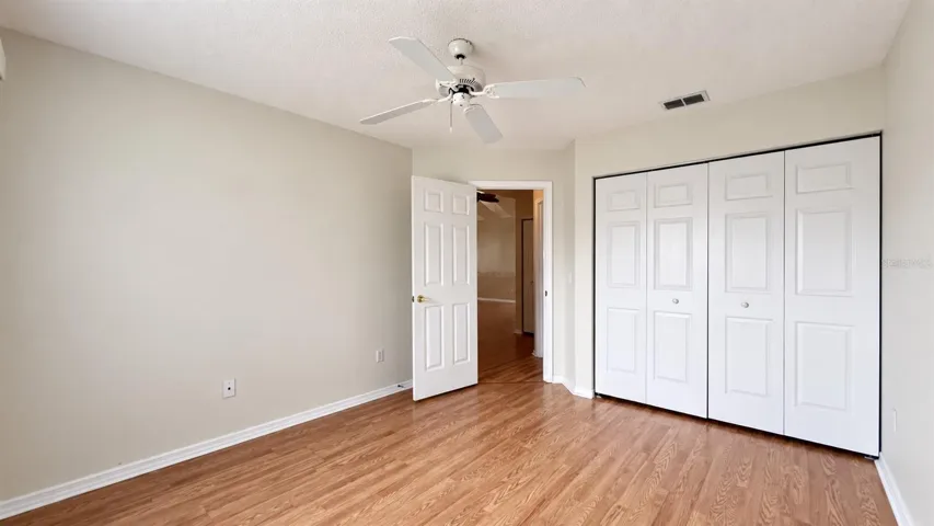 2 of 3 total bedrooms unstaged.