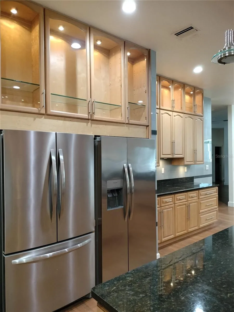Two Stainless Steel Refrigerators