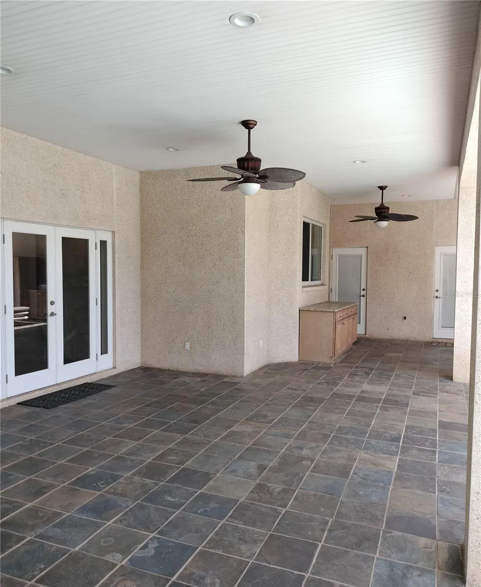 Covered Pool Lanai with slate tiles