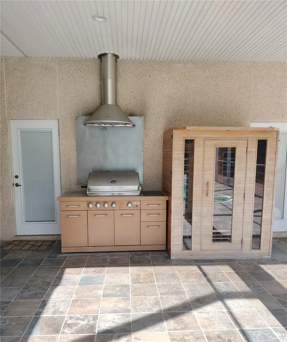 Covered Pool Lanai 16' x 28',  outdoor grill, Pool Bath entrance, Sauna