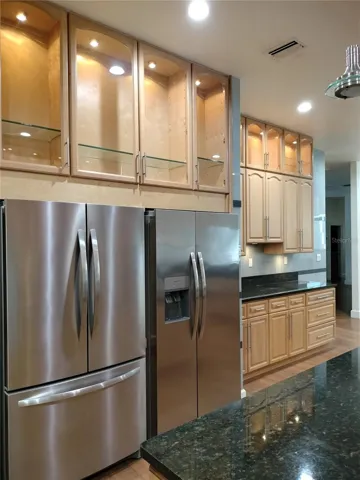 Two Stainless Steel Refrigerators