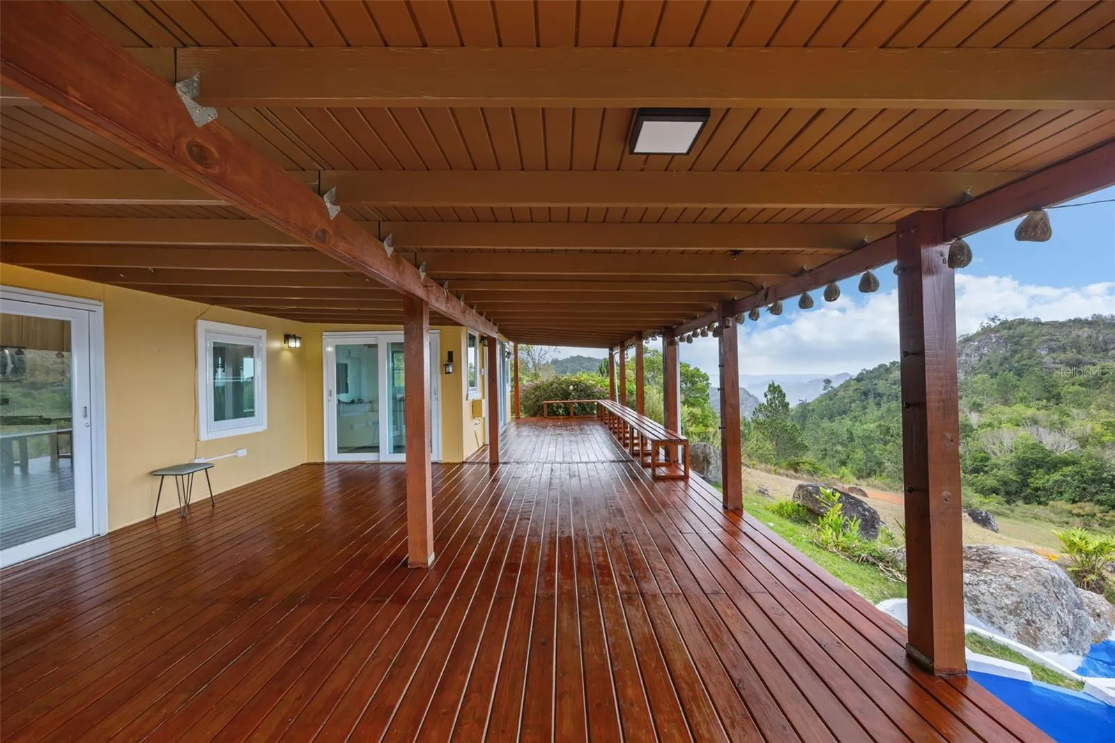Expansive Covered Deck Along the Main Residence- Cayey