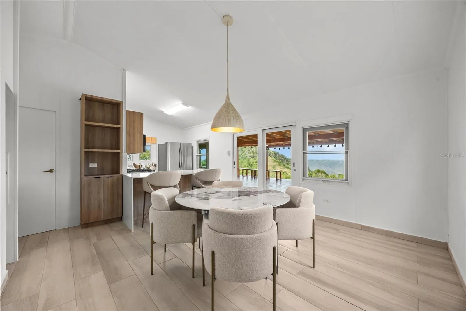Dining Room Overlooking the Covered Veranda and Mountain Views- Cayey