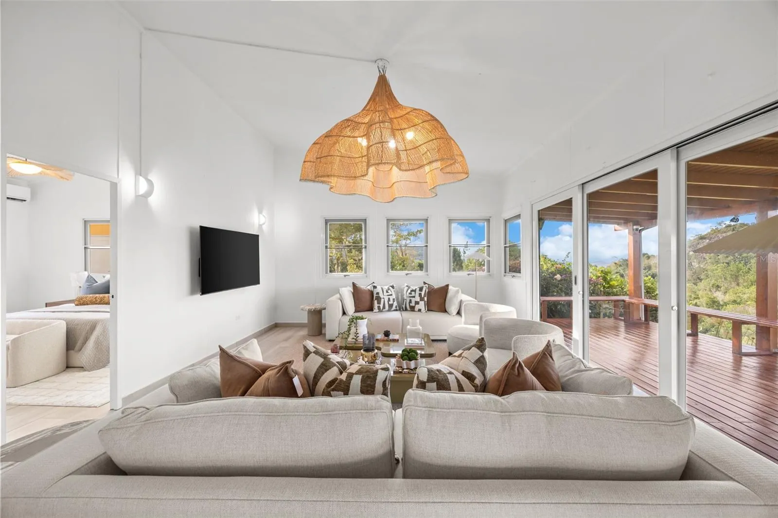 Spacious Living Room with Seamless Connection to the Covered Deck - Cayey
