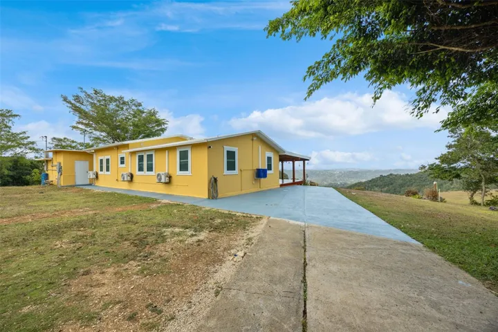 Rear View of the Main Residence and Surrounding Grounds - Cayey