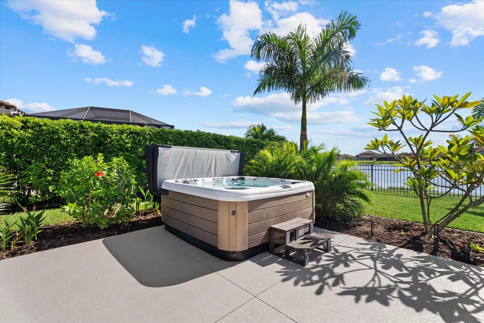 Large patio with hot tub