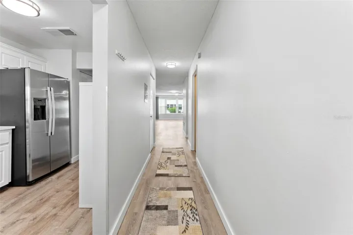 Upon entring, long hallway for artwork or family photos