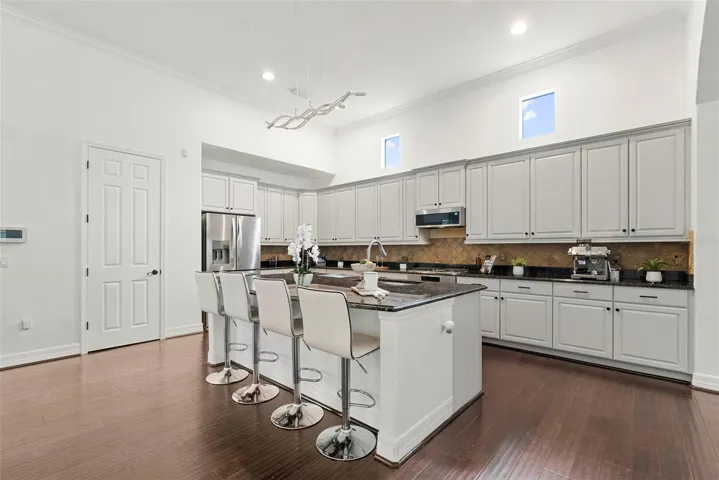 Kitchen-Expansive Island With Bar Seating