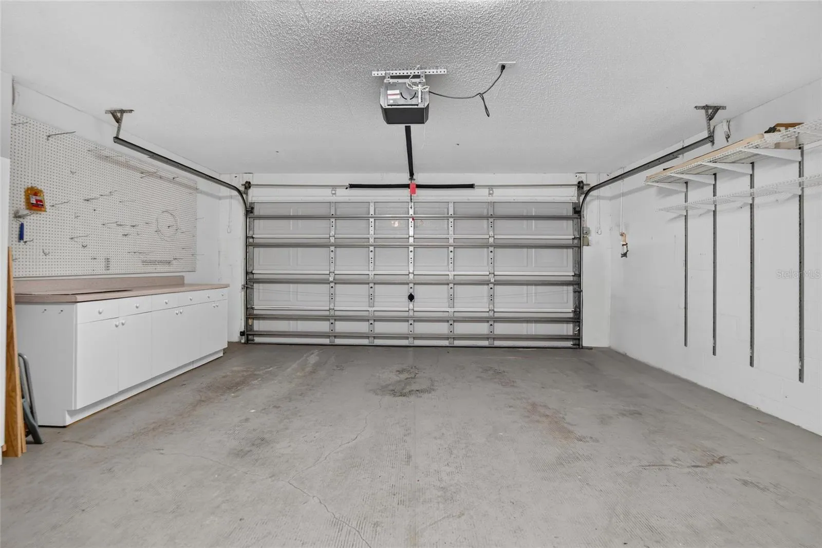 Full 2-car garage with storage