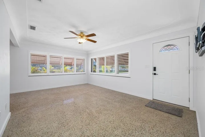 View from Hallway - Front Door and Living Room