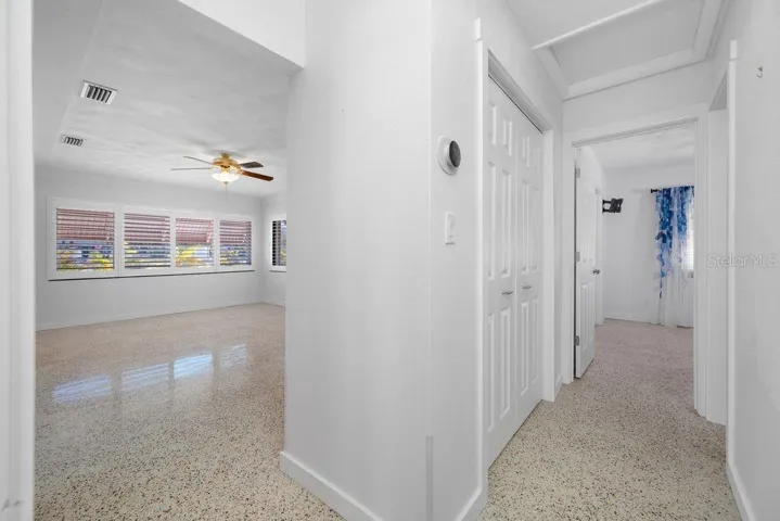 Hallway from Primary Bedroom - Showing Living Room and Split Plan Guest Bedroom