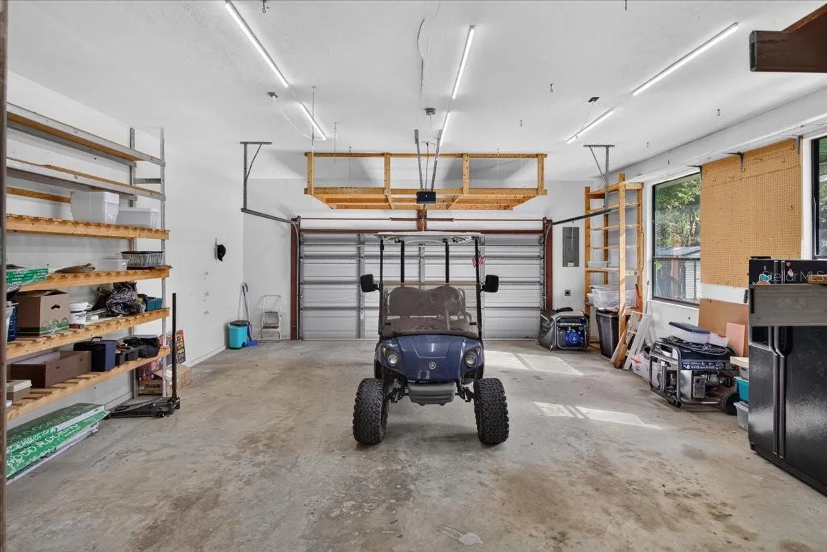 Large Two Car Garage with Built In Storage, Garage Fridge, Generator and Gas Golf Cart