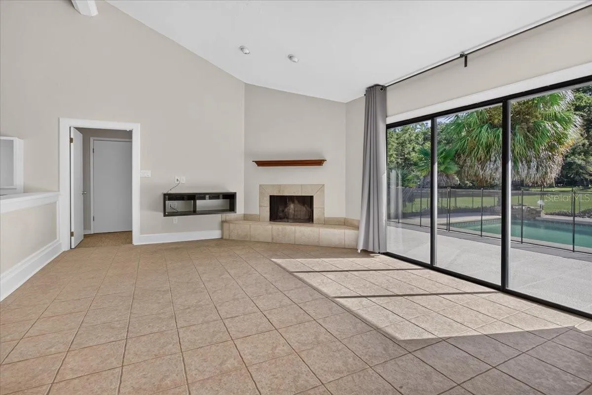 Living Room with Sliding Door access to Pool