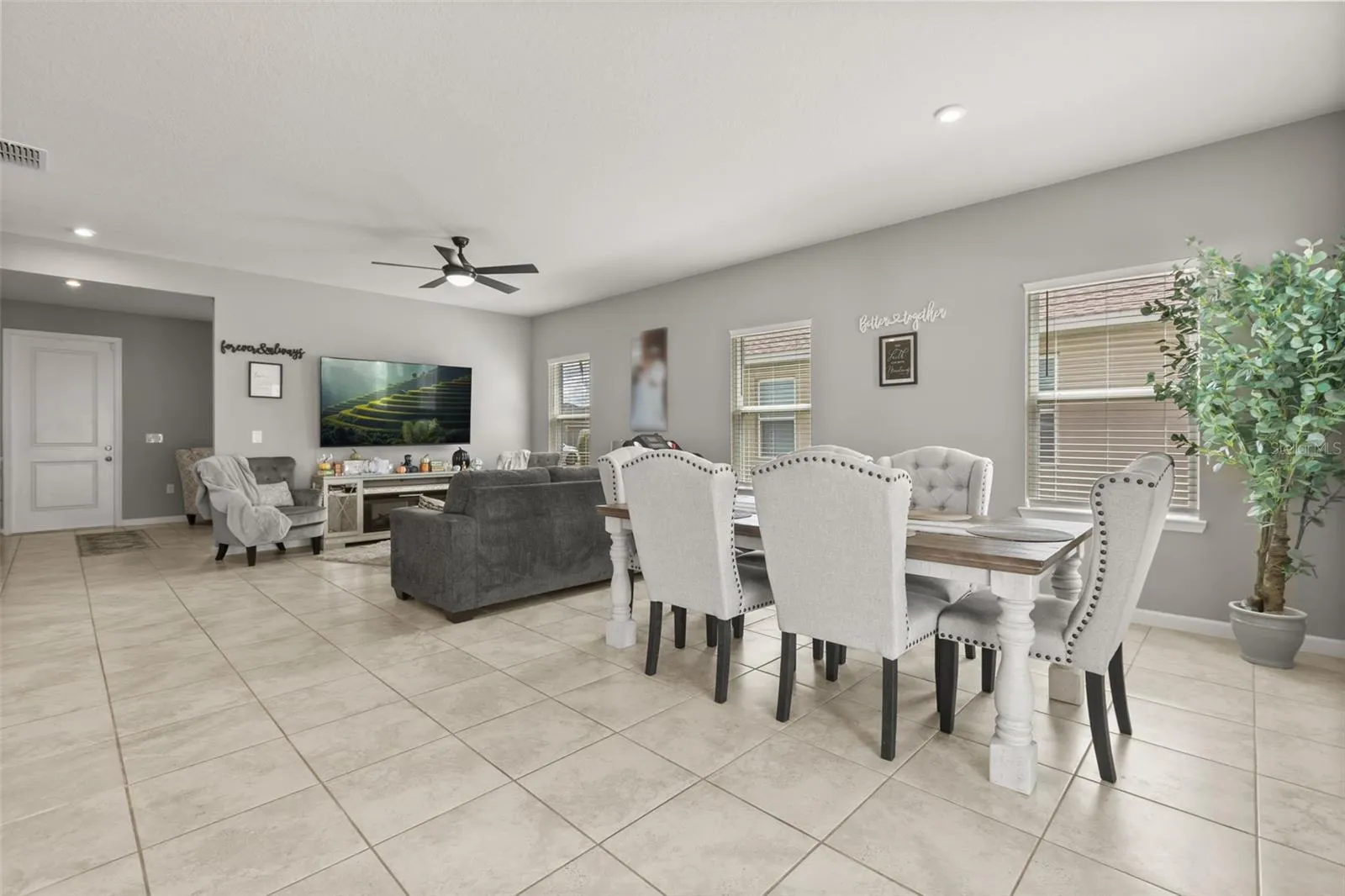 Open concept dining and family room areas.