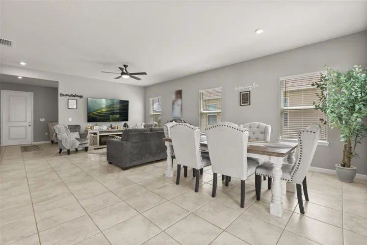 Open concept dining and family room areas.