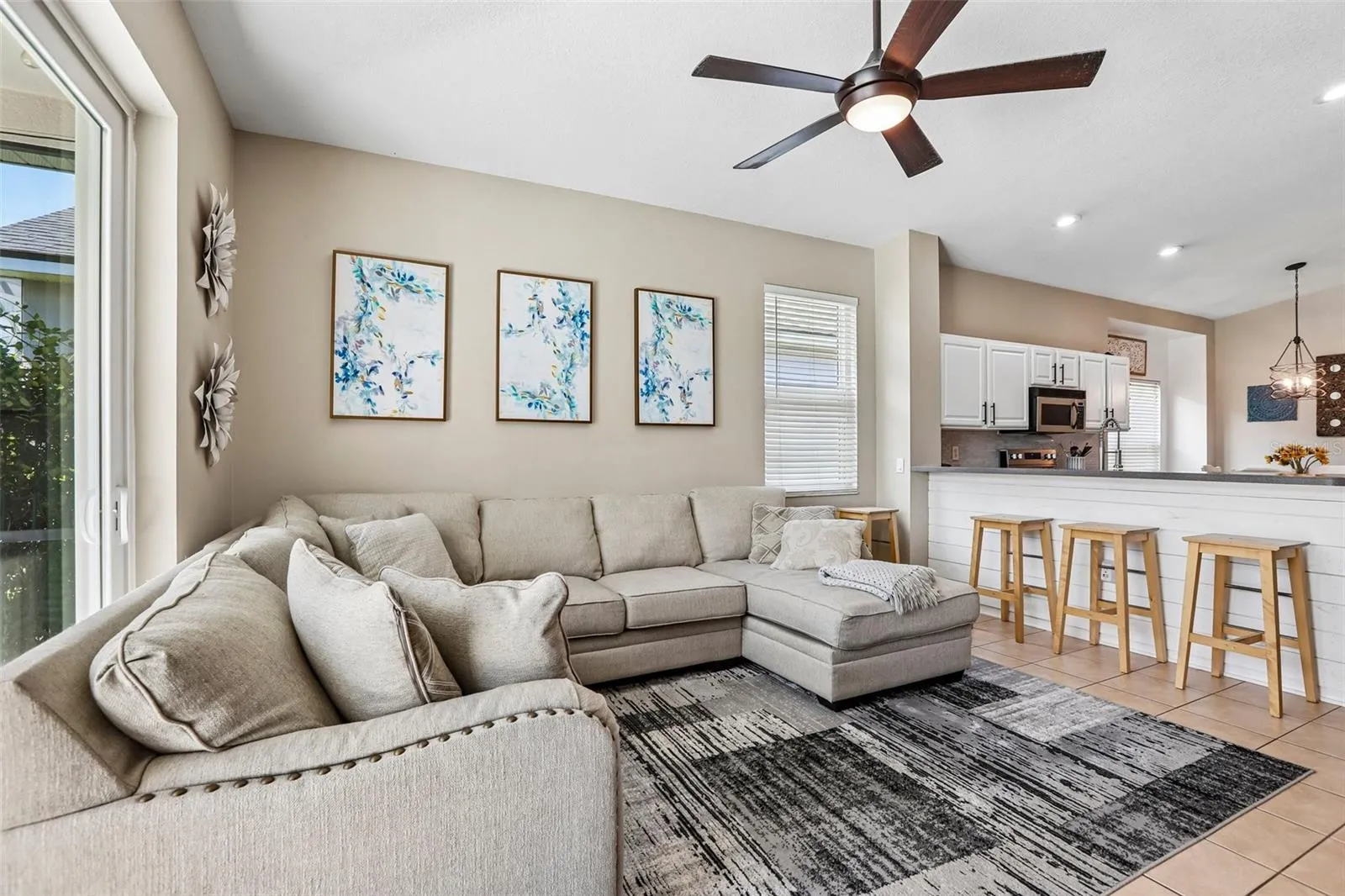 Family Room with View to Kitchen (bar stools convey)