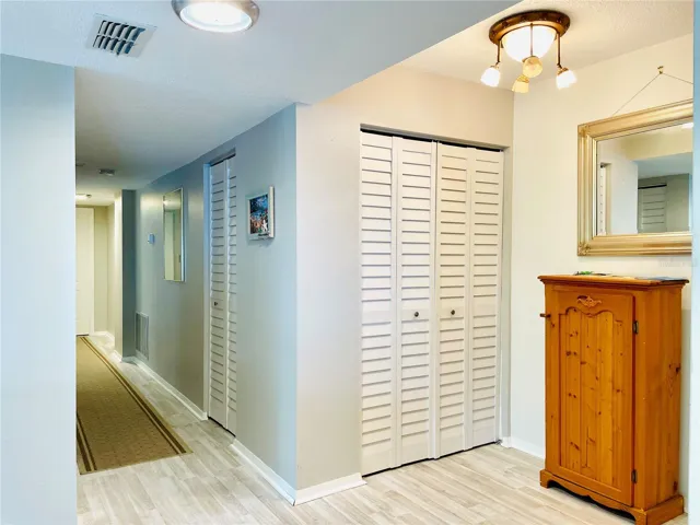 Large entryway with storage closet
