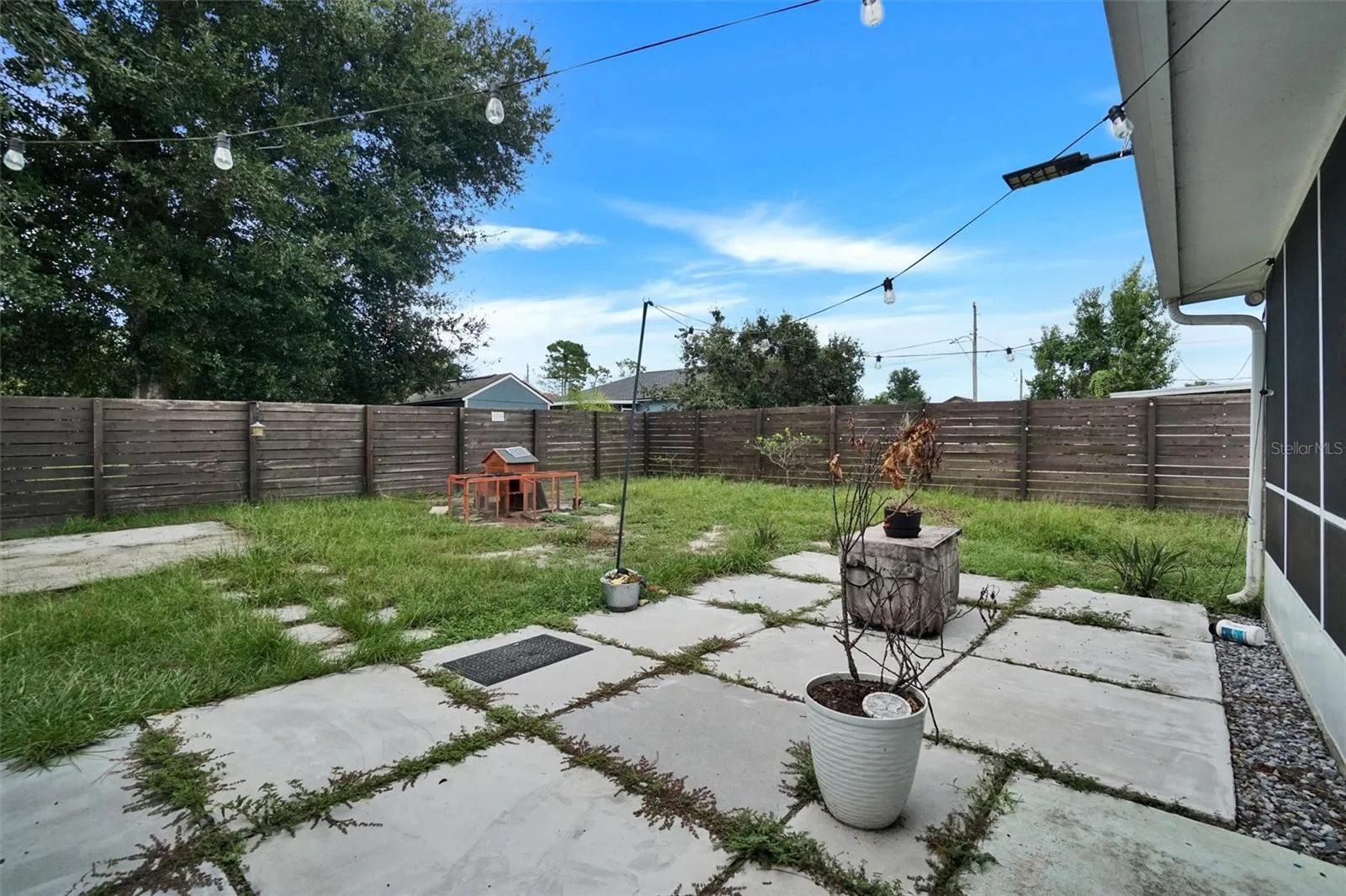 OPEN CEMENT PATIO / BACKYARD